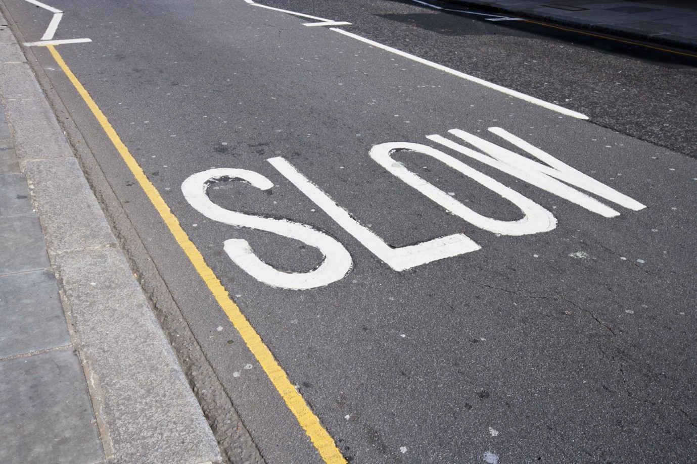 Image: Close up of road marking in London, UK, Shutterstock