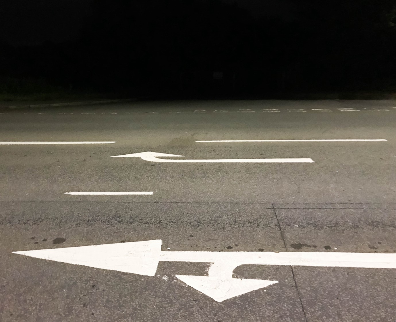 Image: Lane markings on a main road lit by LED streetlights, Shutterstock