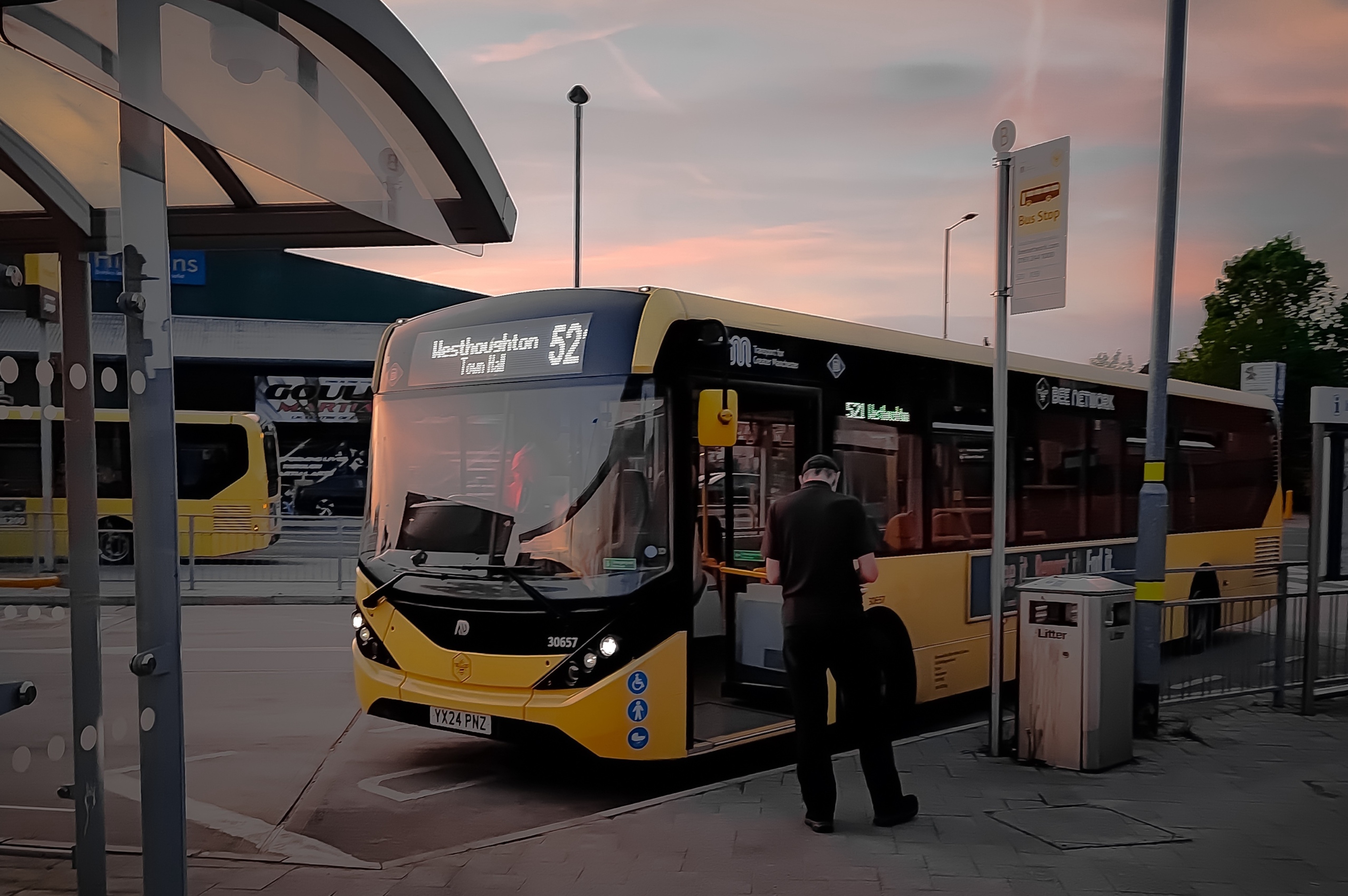 Image: Bee Network bus stopping in Farnworth, Bolton. Credit: Shutterstock.
